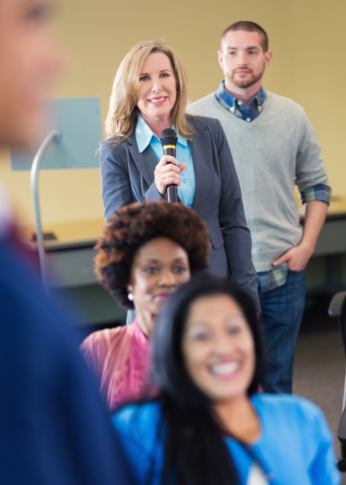 photo of local government workers at a meeting